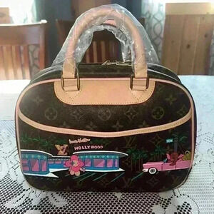Louis Vuitton Trouville, this item been altered.
